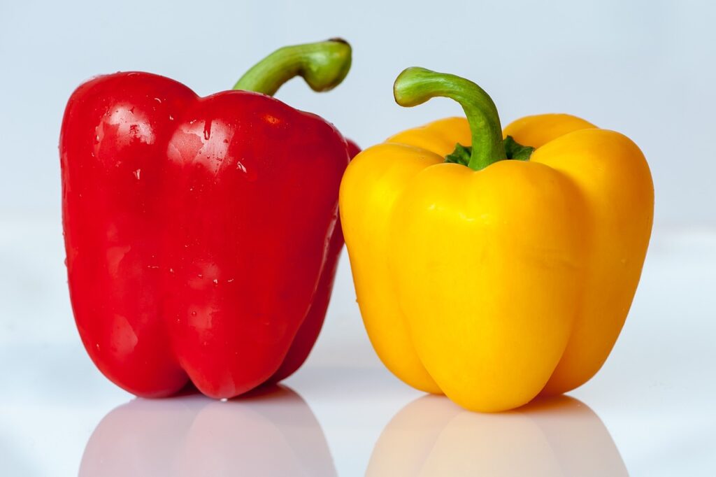 Image of red and yellow bell peppers.